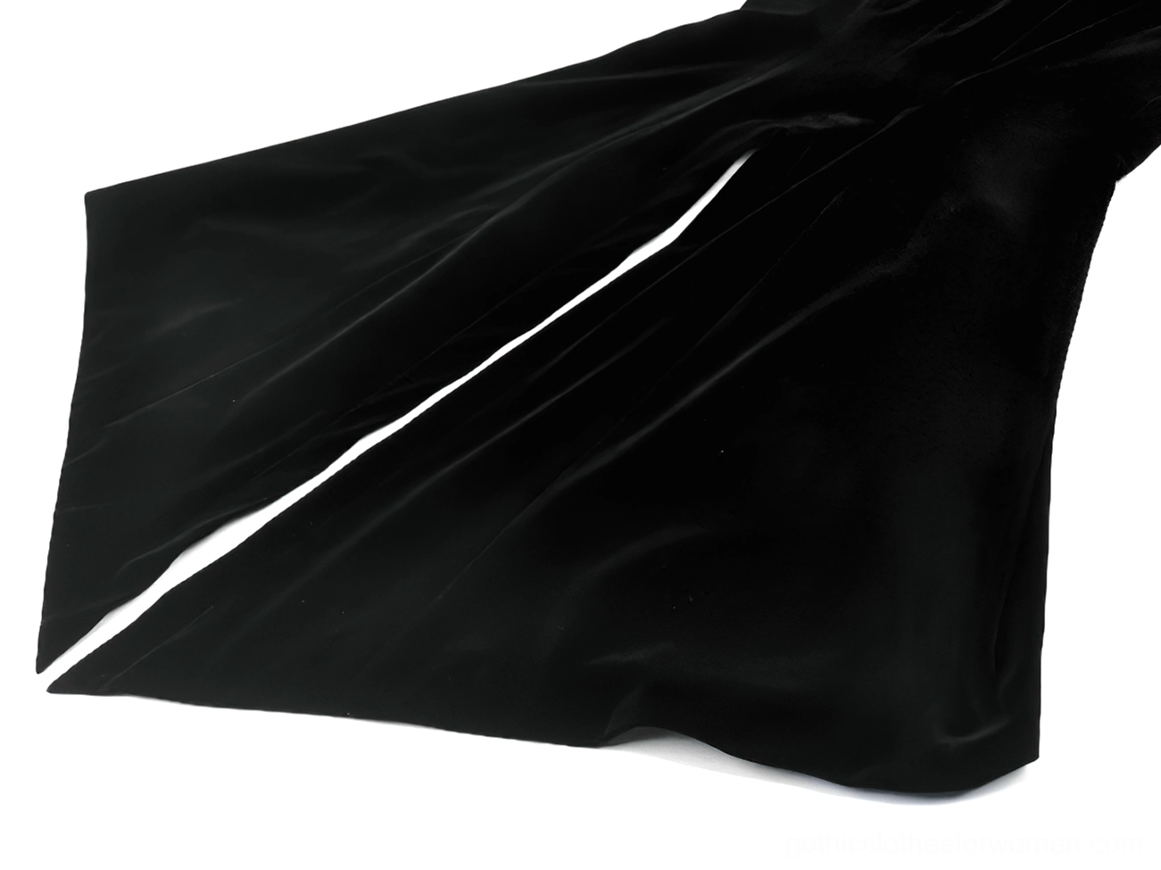 Gothic tailcoat construction detail highlighting satin trim, button placement, and architectural seaming