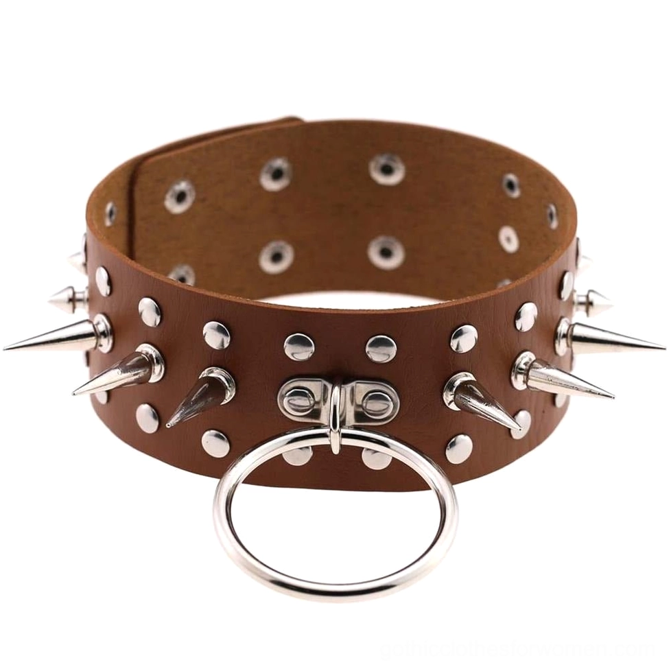 Tan brown faux leather spike choker with metal studs and gothic style O-ring pendant flat lay front view