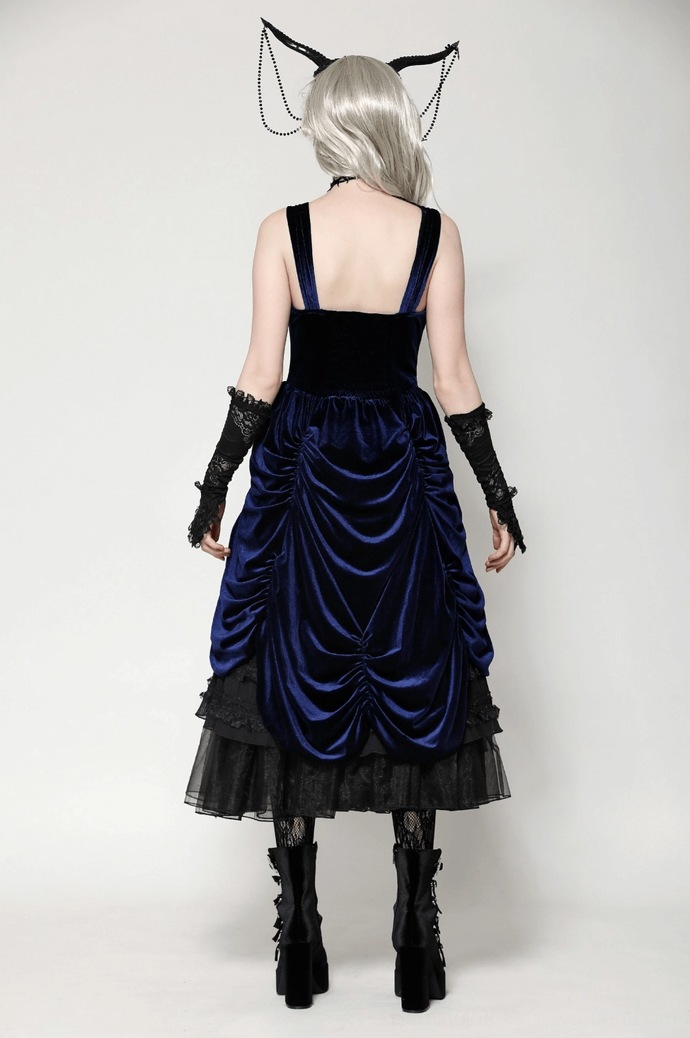 Three-quarter view of Gothic Lolita dress showing the tiered ruffled skirt construction and corset bodice integration