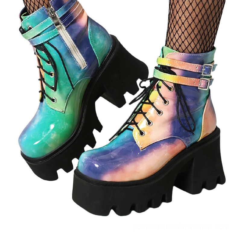 Tie-dye blue green purple pink patent leather gothic ankle boots with dual buckle straps, lace-up front, and side zipper detail