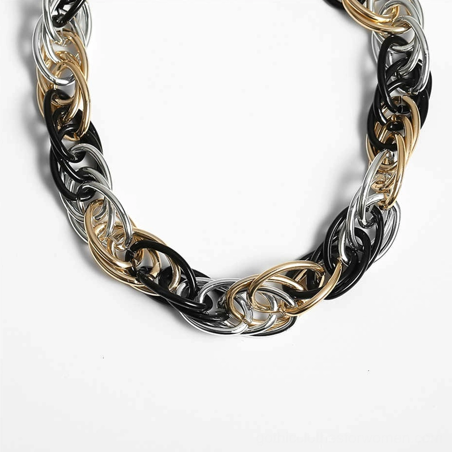 Front flat lay of full tri-tone twisted curb chain necklace, statement gothic jewelry piece
