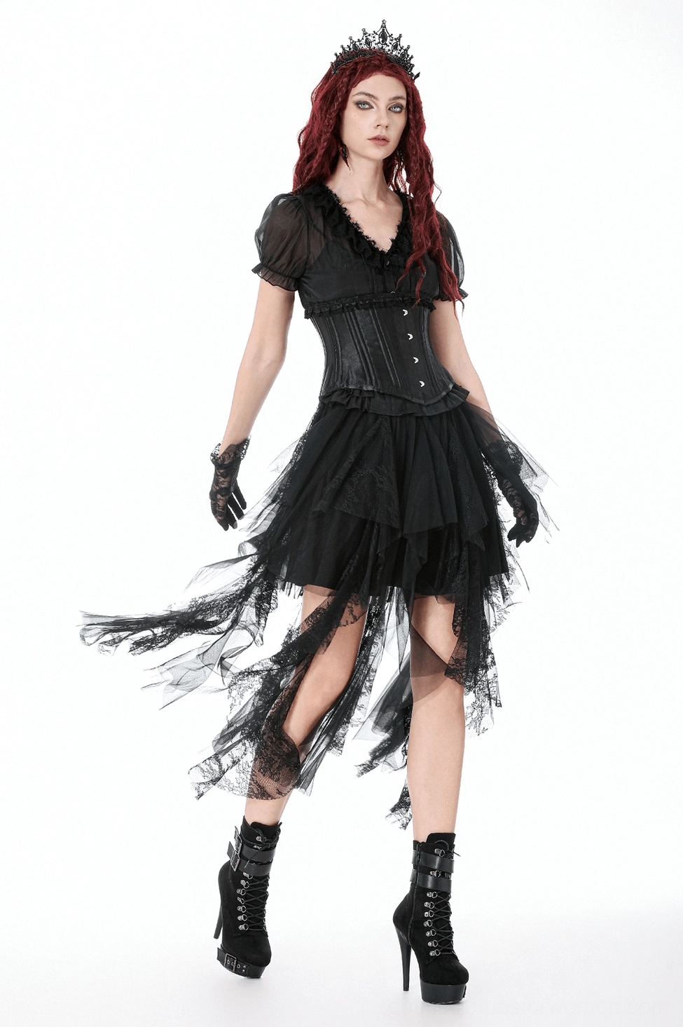 Detail view of black tulle skirt showing elastic drawstring closure and layered ruffled construction