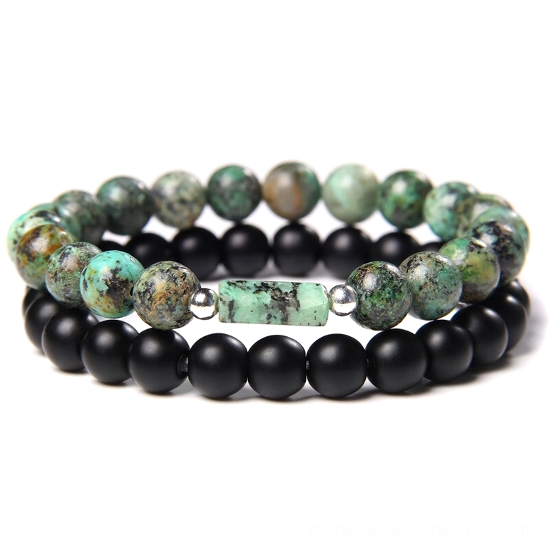 Turquoise green variegated stone beaded bracelet with matte black beads and green rectangular accent, mystical gothic design