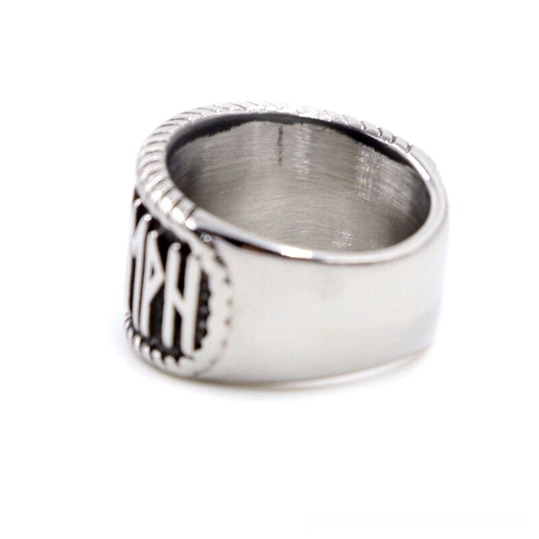 Valknut ring side view highlighting polished inner band and partial outer rune engravings on stainless steel band