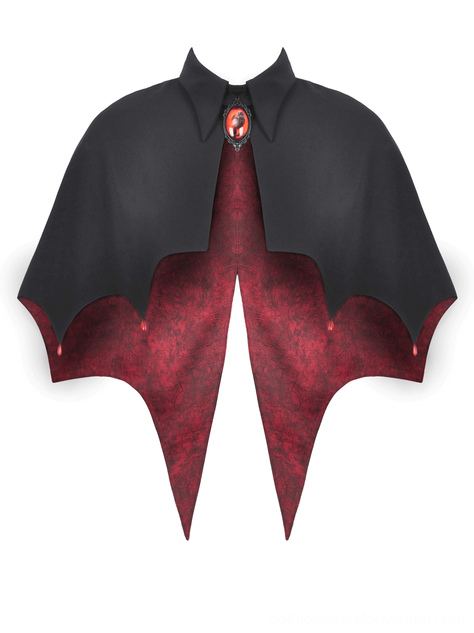 Flat lay front view of black gothic vampire capelet showing outer fabric, red bat-wing inner lining, and jeweled collar clasp detail