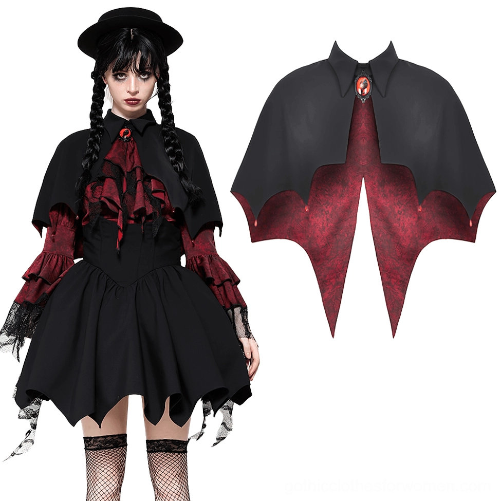 Front three-quarter view of vampire cape costume set showing red marbled bat-lining interior, jeweled high collar clasp, and irregular hem mini skirt detail