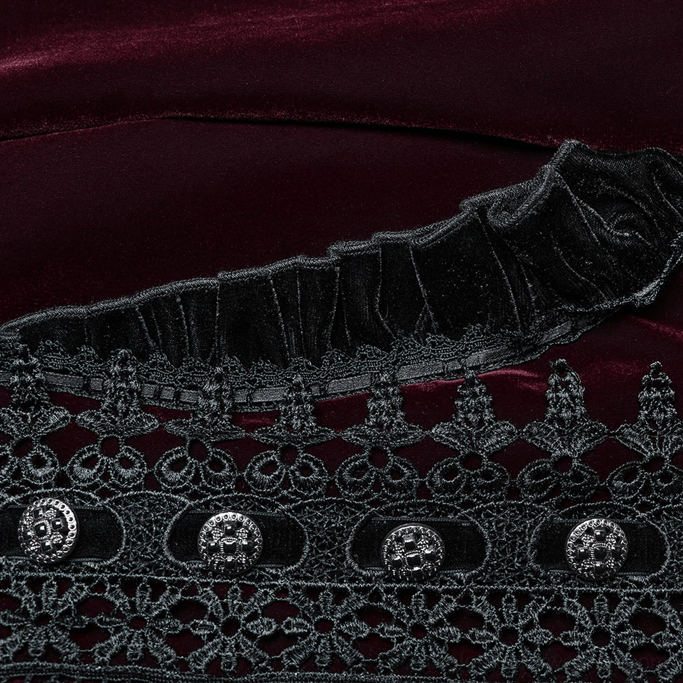 Close-up textile detail of burgundy velvet fabric with ruffled lace trim on gothic coat