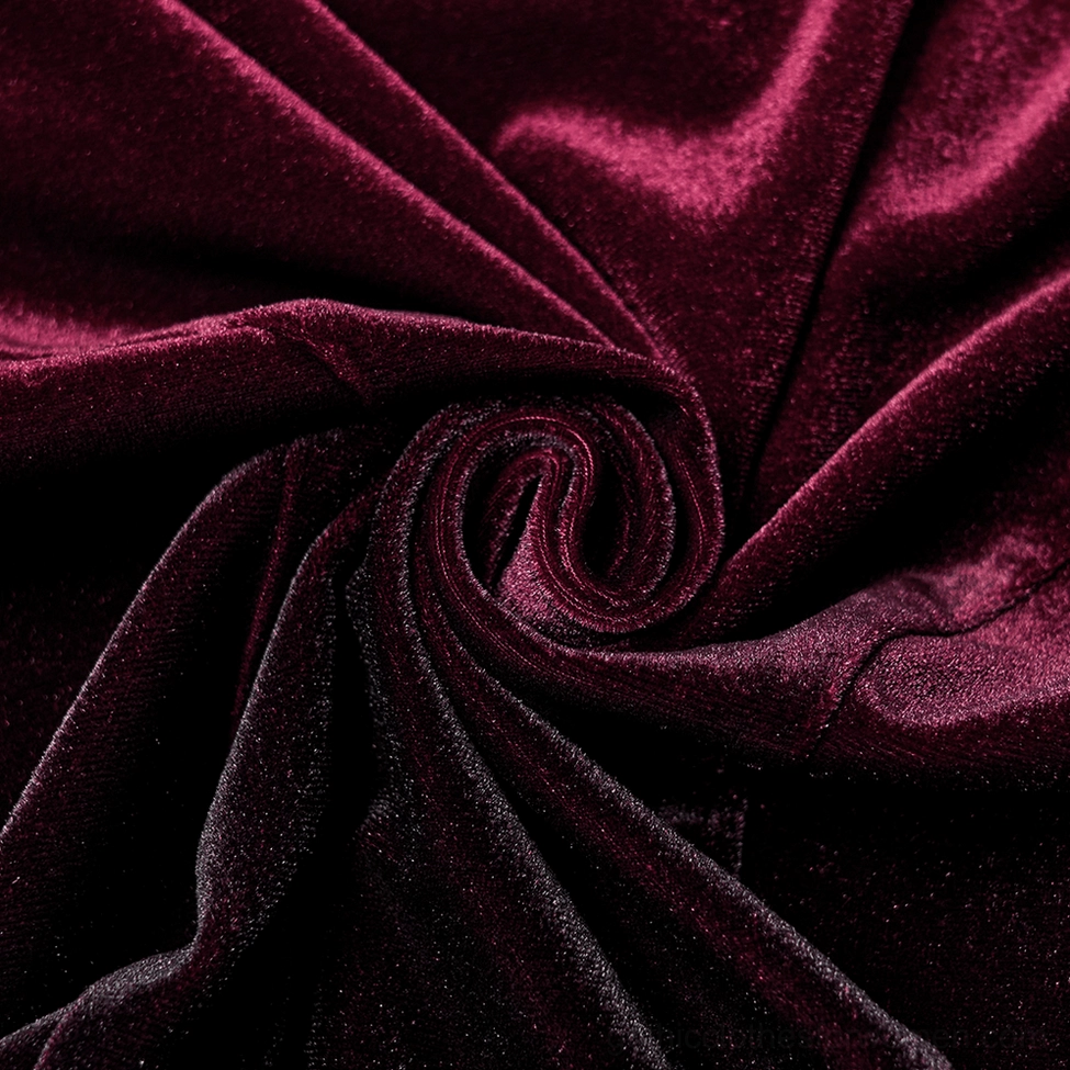 Luxurious plush velvet fabric ombre burgundy to black gradient close-up texture