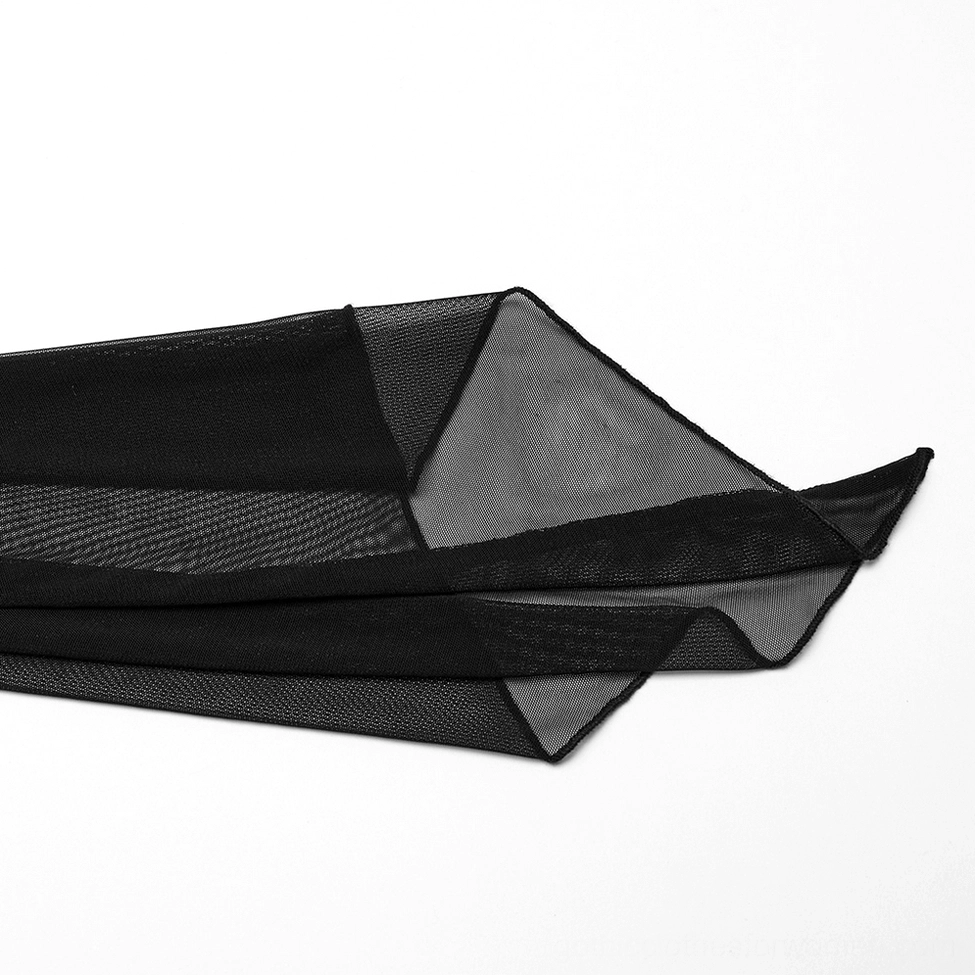 Close-up detail of black velvet mesh and sheer mesh fabric blend with angular paneling design