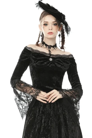 Black velvet off-shoulder gothic top with lace bell sleeves, front three-quarter view on model
