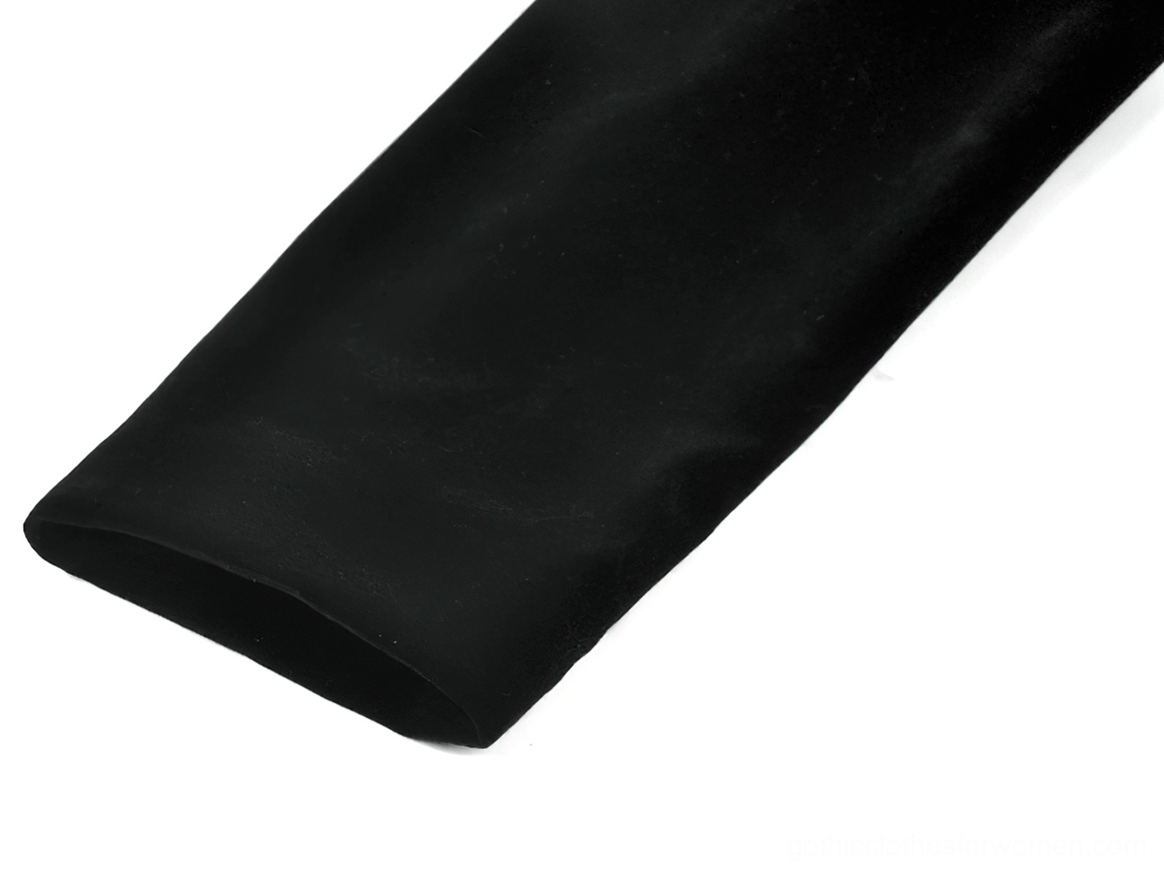 Close-up of black velvet sleeve showing smooth fabric texture and long sleeve silhouette of gothic tailcoat