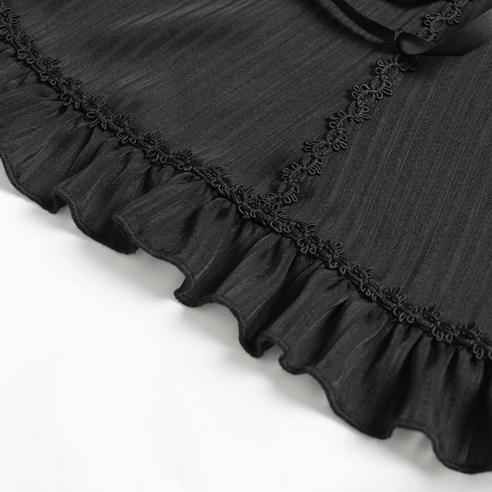 Side profile view of black Victorian blouse showing silhouette, sleeve construction, and waist definition