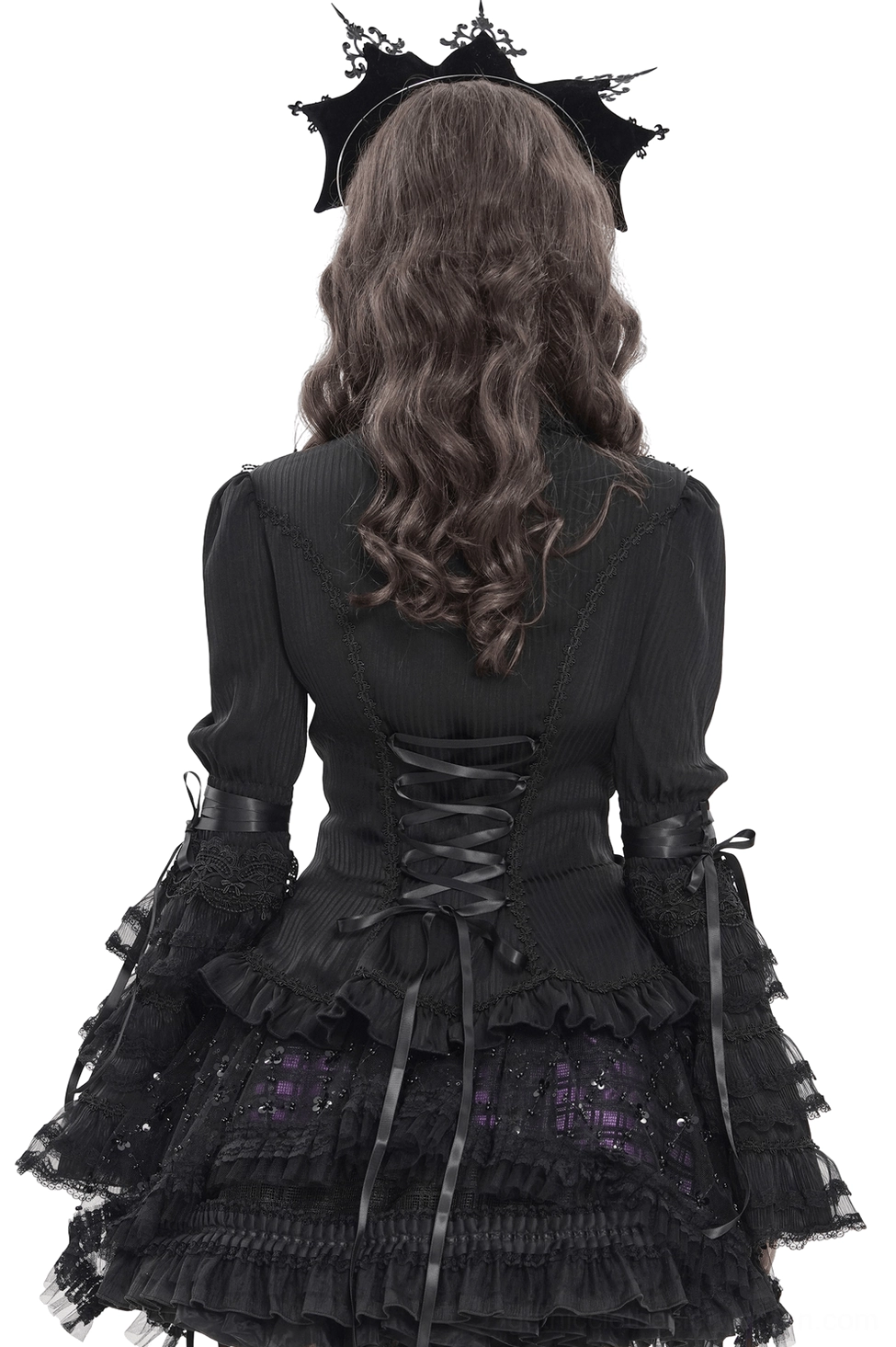 Gothic lace-up corset back detail with layered ruffles, rear view on model with long curly hair
