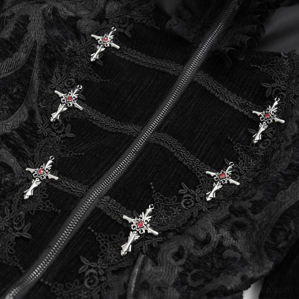 Close-up detail of black gothic lace blouse front embroidery trim with cross charms and red gem accents