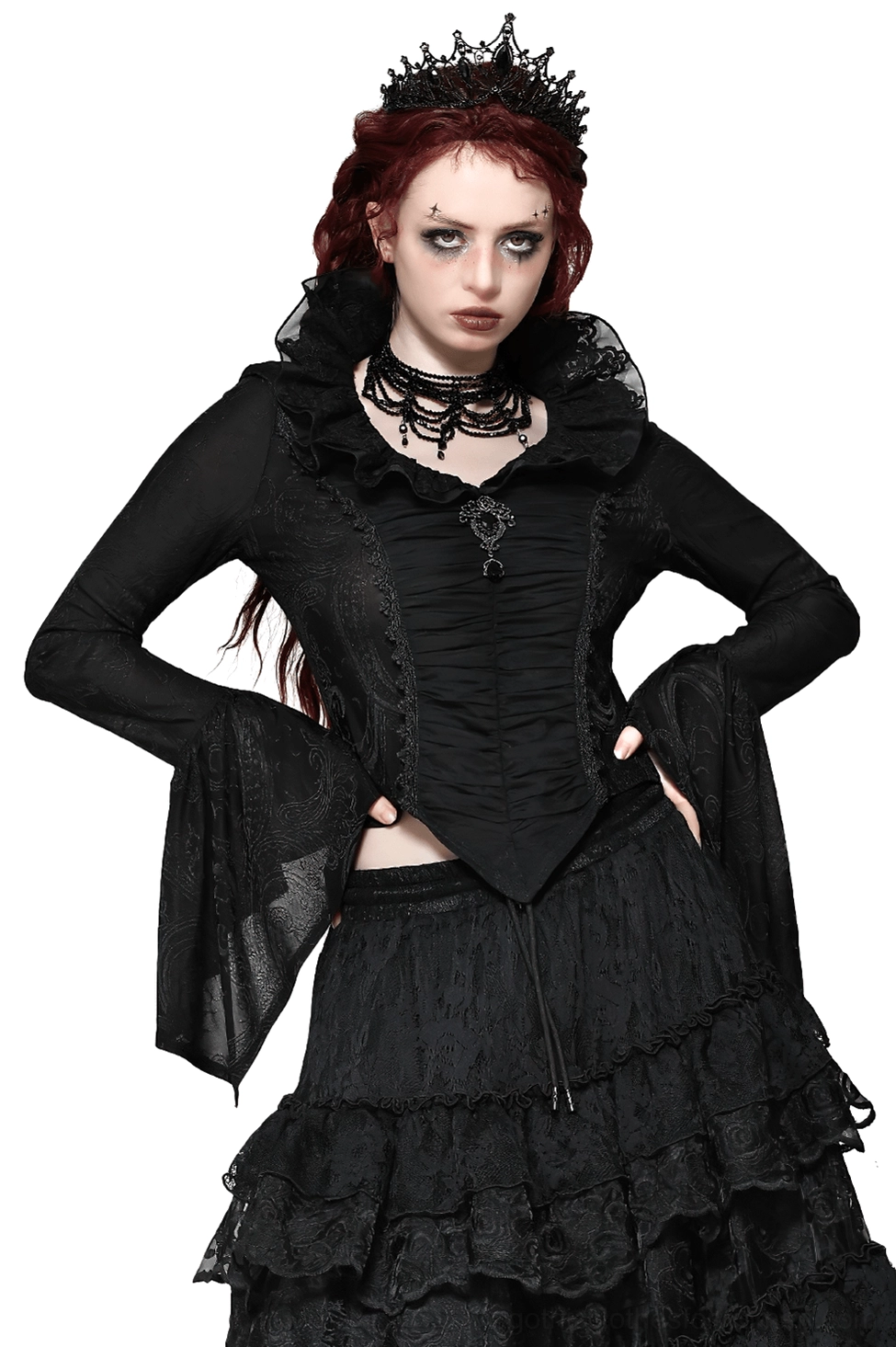 Black Victorian gothic blouse front view featuring dramatic ruffled collar, ruched bodice, flared bell sleeves with lace trim, and ornamental filigree brooch on red-haired model
