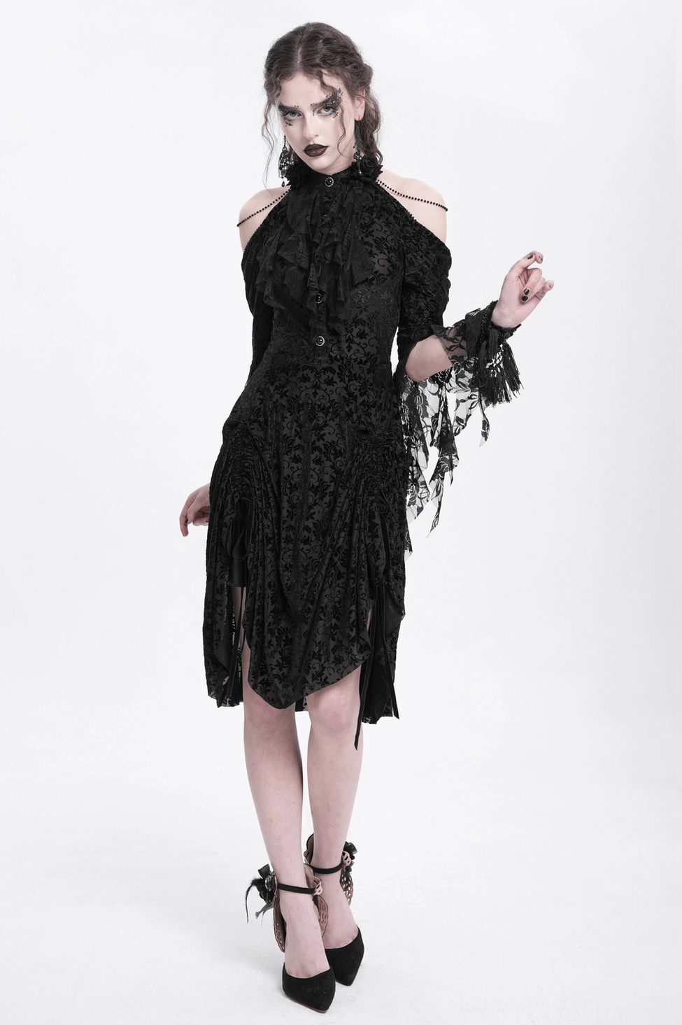 Black Victorian gothic lace dress showing back lace-up closure and full lace sleeve construction