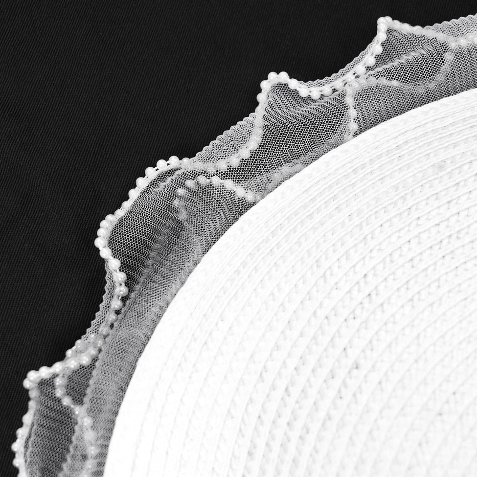 Victorian-inspired gothic fascinator hat with strategic floral placement for elegant dark styling