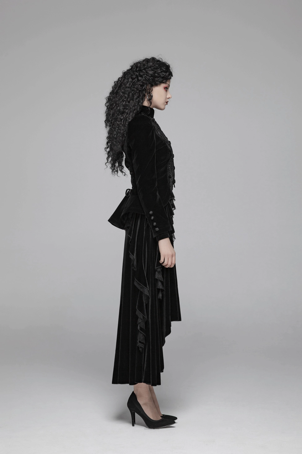 Gothic black velvet tailcoat with Victorian-inspired design, featuring ornate lace embroidery, structured puff sleeves, and corset lace-up back closure for alternative fashion