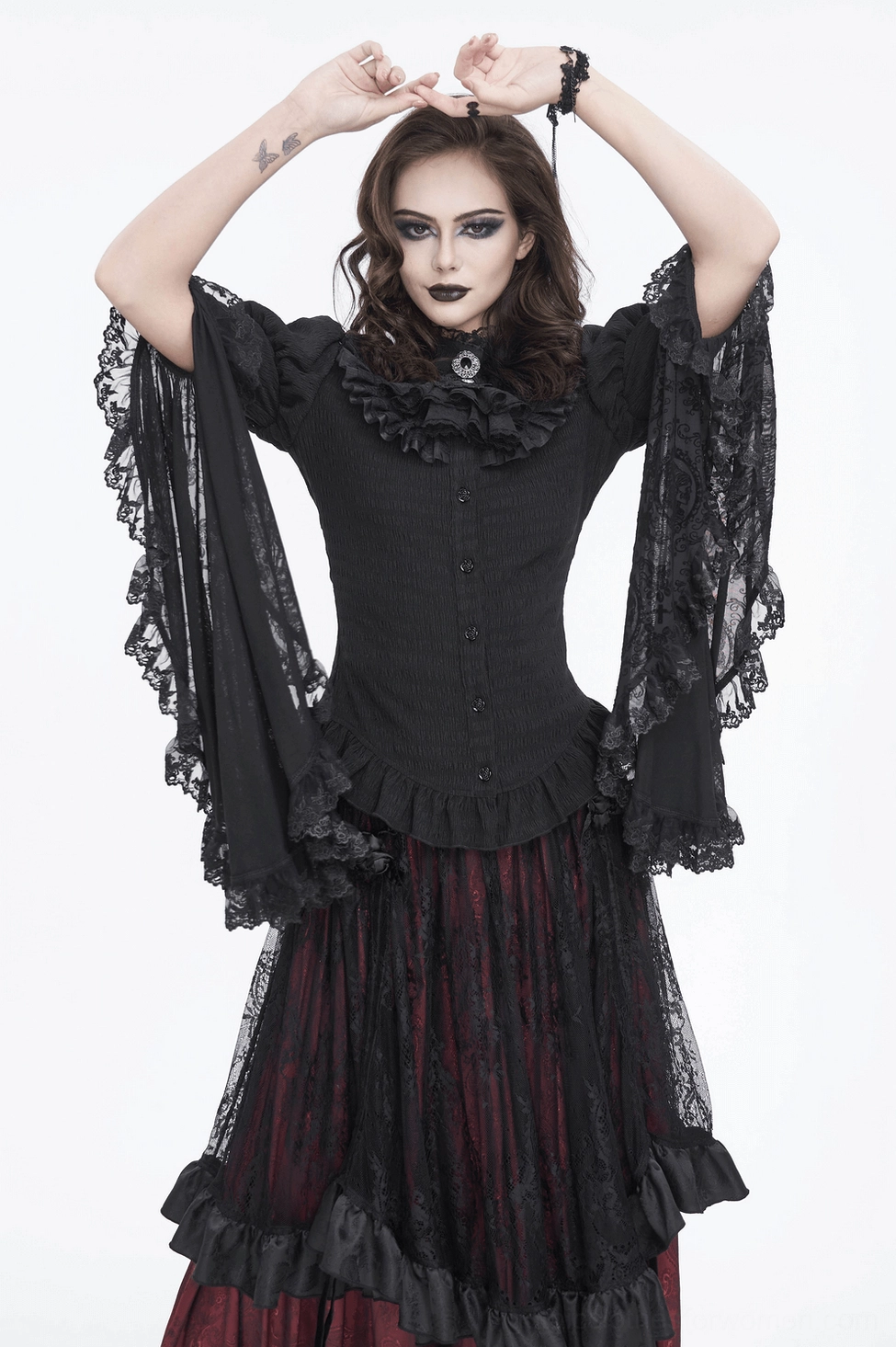 Black Victorian lace blouse three-quarter view highlighting ruffled collar and bell sleeves proportion