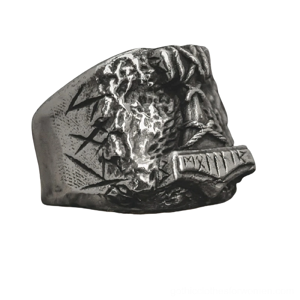 Norse rune signet ring side oblique view showing intricate carved Viking amulet details in aged silver tone