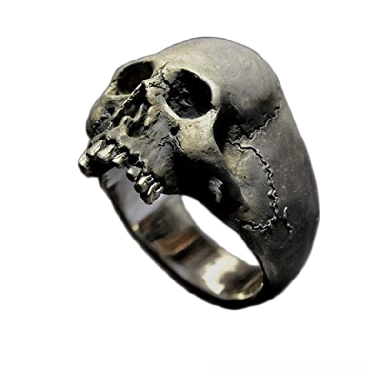 Vintage skull ring in aged silver zinc alloy with detailed textured design and exposed teeth, front oblique view