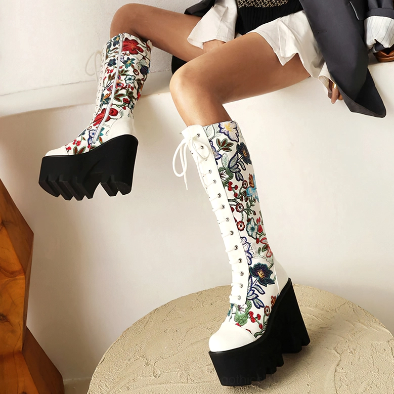Gothic floral platform knee-high boots featuring waterproof microfiber upper and durable lace-up construction