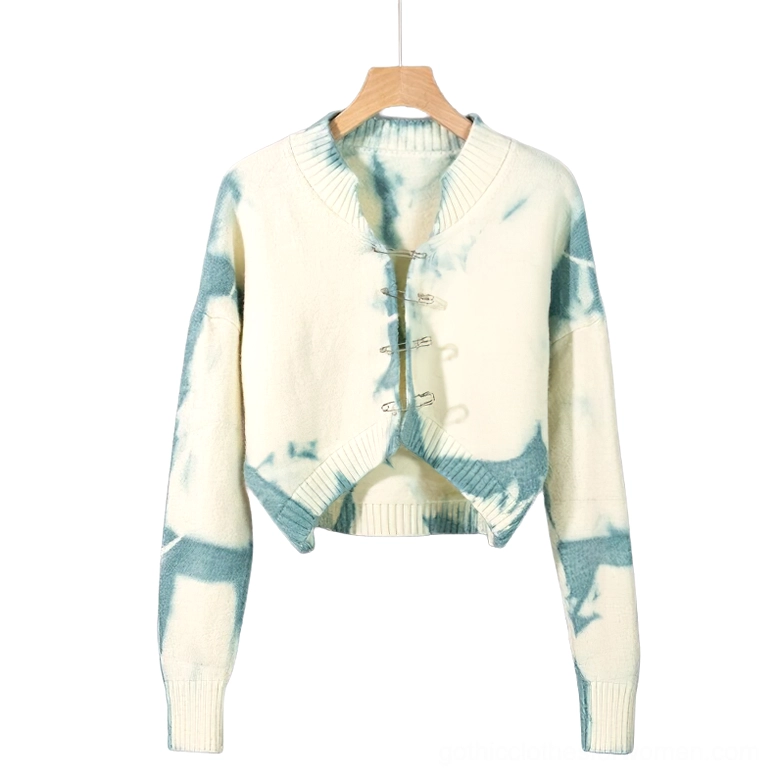 White and blue tie-dye cropped cardigan with safety pin fasteners, flat product display