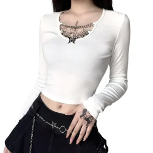 White long sleeve gothic crop top with chain and pentagram asymmetrical neckline, fitted silhouette, front studio view