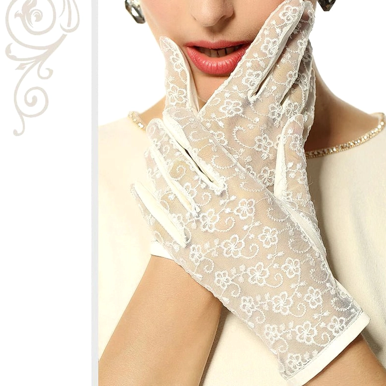 White embroidered lace gloves with floral stitch pattern, delicate gothic design, wrist-length elegant style