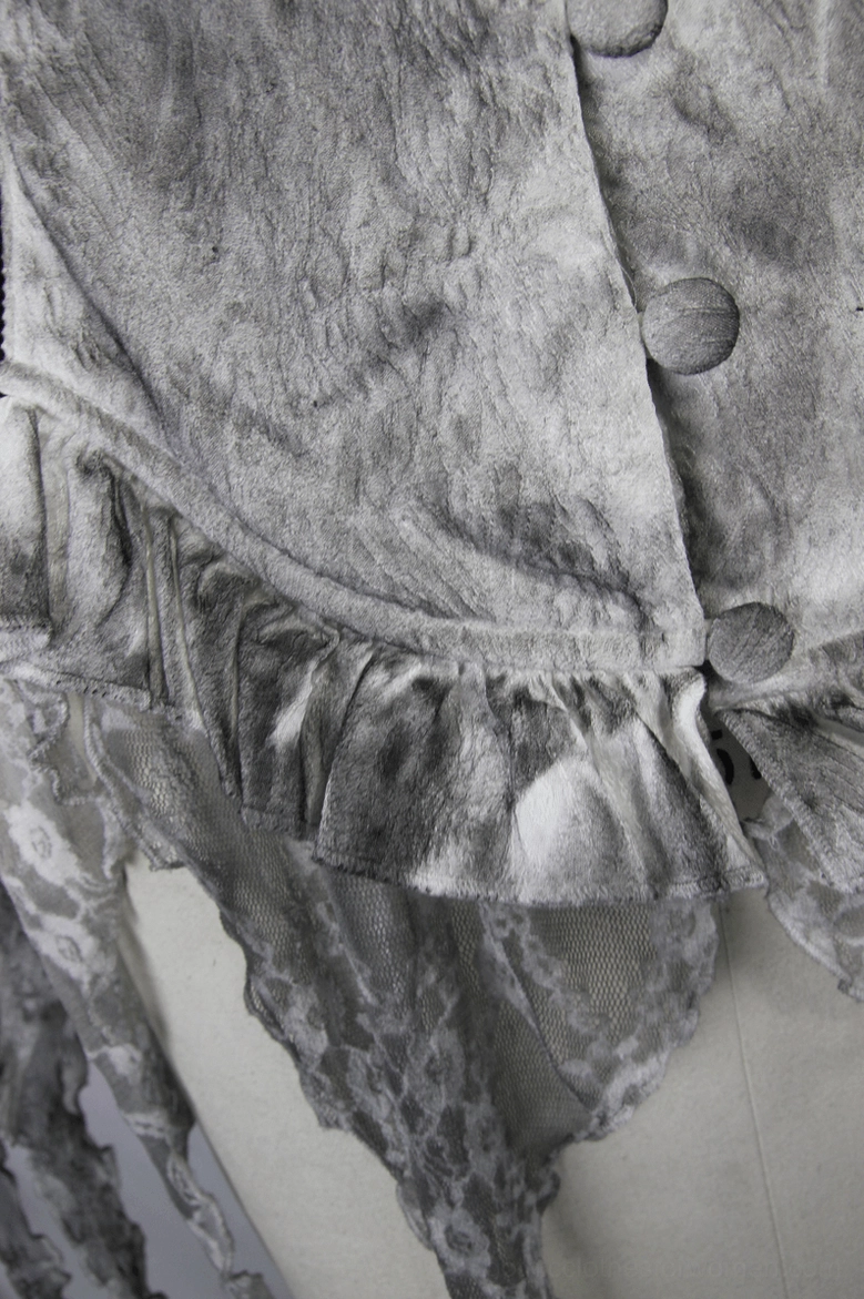 White gothic deep V chiffon blouse fabric detail showing distressed texture and construction