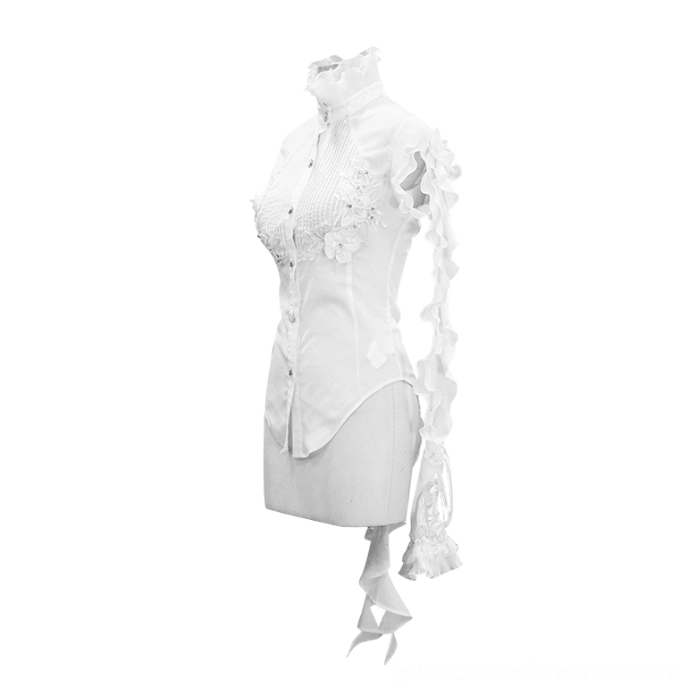 Side three-quarter view of white gothic sleeveless blouse displaying floral appliqué and single ruffled sleeve detail