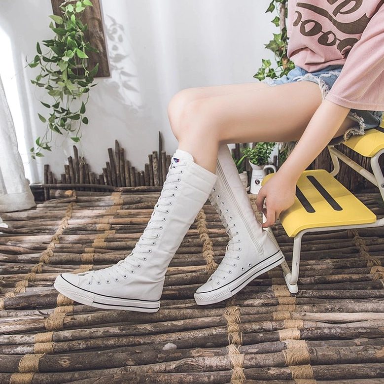 Women's white canvas high-top gothic boots clean minimalist design perspective