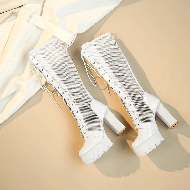 White gothic platform boots detailed side profile showing architectural heel construction and mesh paneling