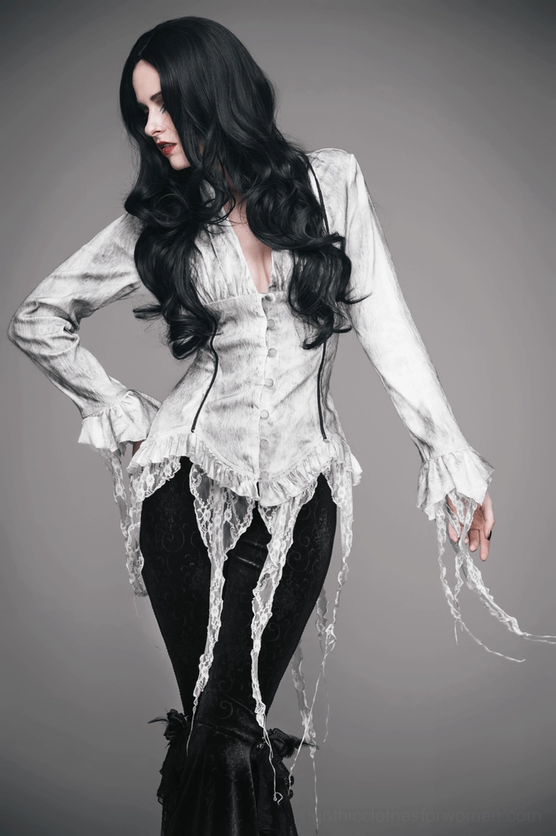 White gothic blouse detail shot of layered chiffon and distressed hem styling