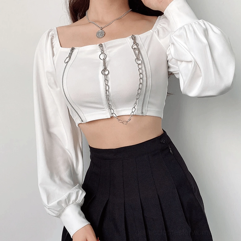 White gothic off-shoulder crop top detail view showing zipper and chain elements