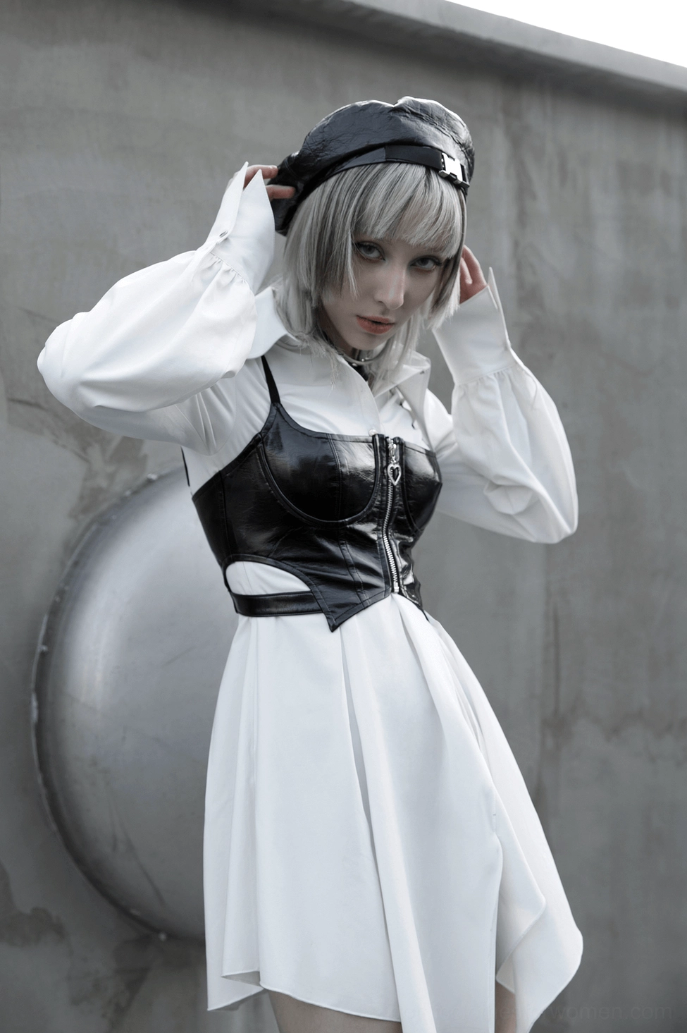 White gothic swallowtail dress fitted waist and torso detail, showing tailored construction and pointed collar design elements