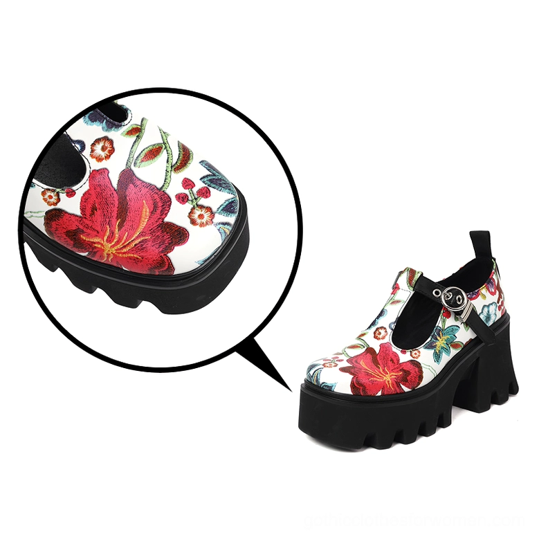 White base gothic floral platform Mary Jane pump with contrasting red floral print and metal T-strap buckle system