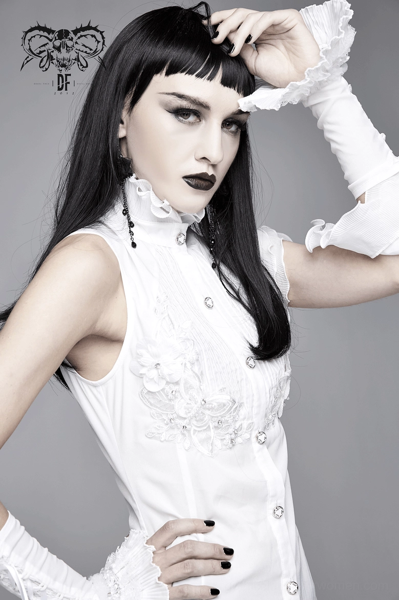 White gothic formal blouse worn by model showing full length proportions and embroidered front panel