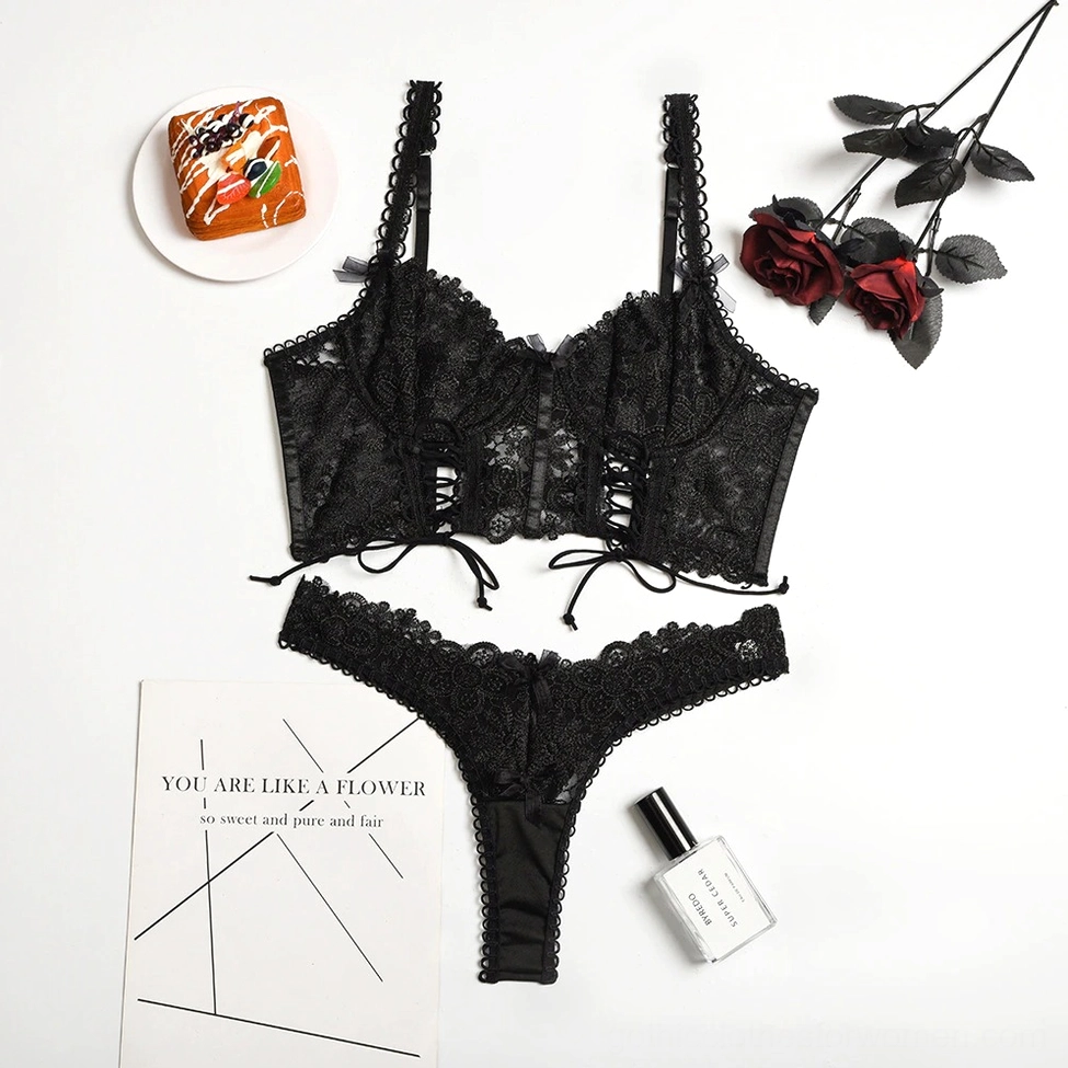 White gothic lace lingerie bra detail with adjustable straps and underwire support structure