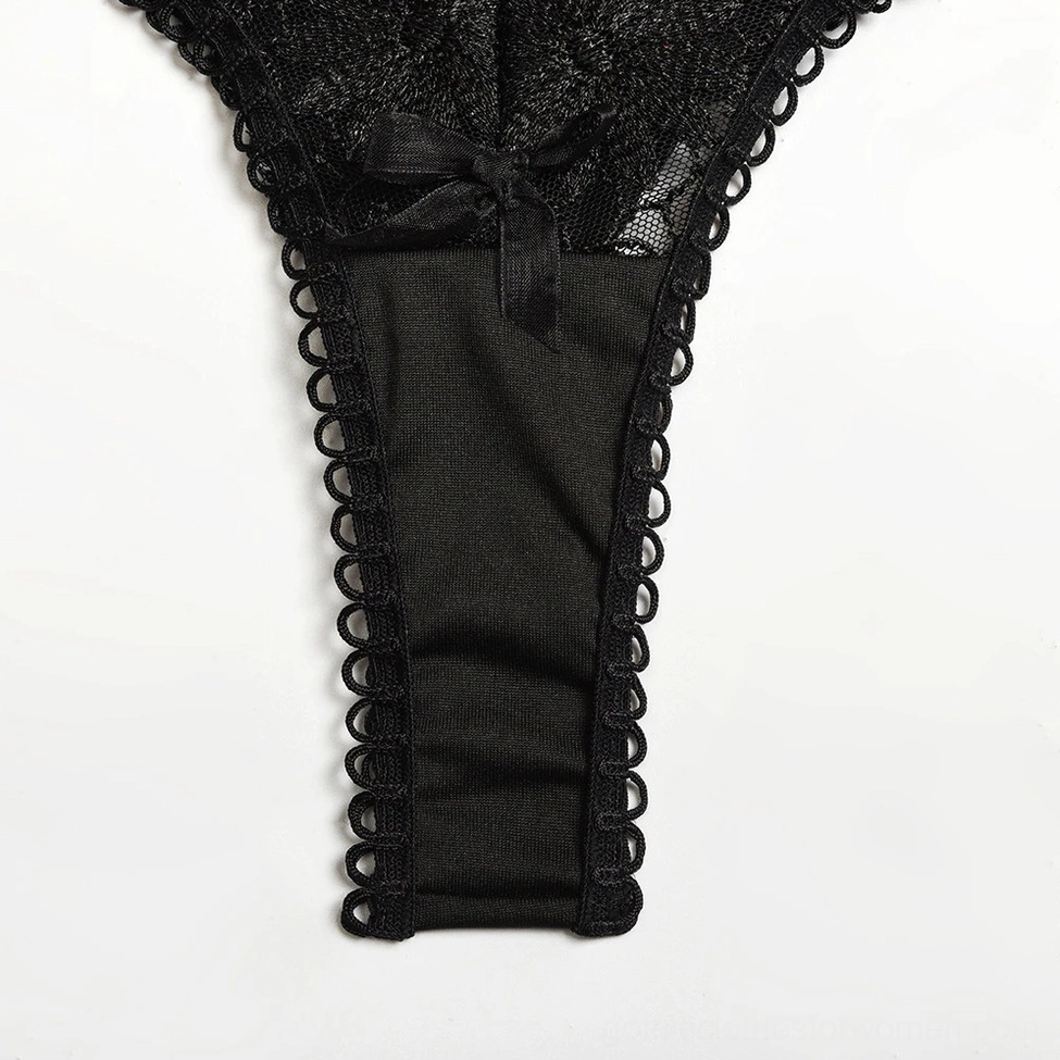 White lace gothic lingerie thong back view showing delicate construction and fit