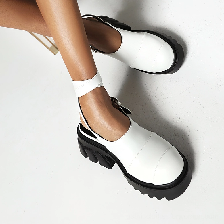 White gothic platform sandals on model feet - overhead view showing platform height and sole design