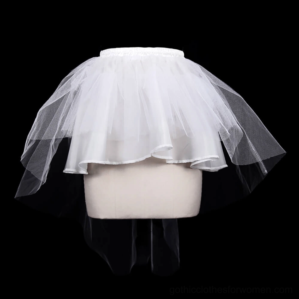 Pure white sheer tulle gothic mini skirt with elastic waistband front view on black background