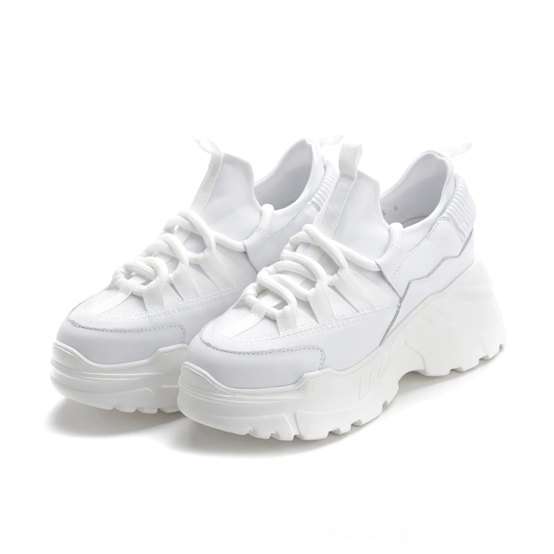 White women's platform leather sneakers pair with matching thick lug sole and lace-up closure