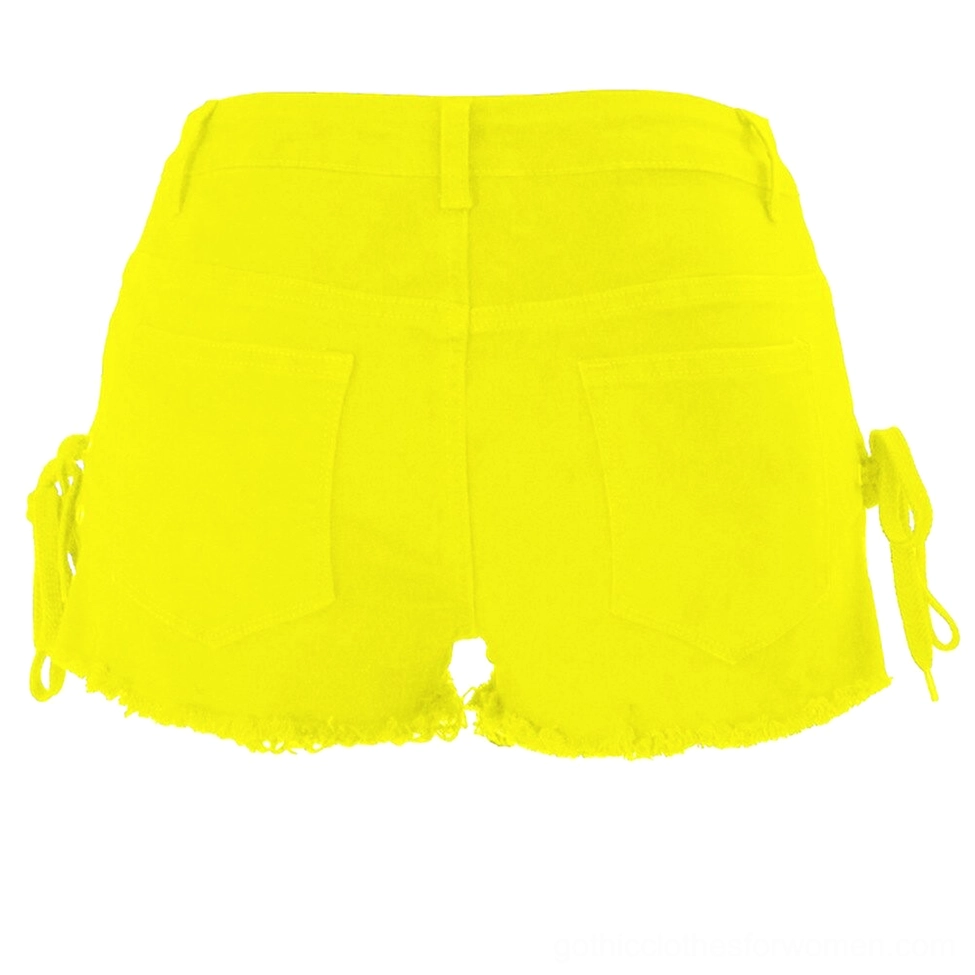 White denim shorts front view with side lace-up closure, button fly, and distressed ripped hem