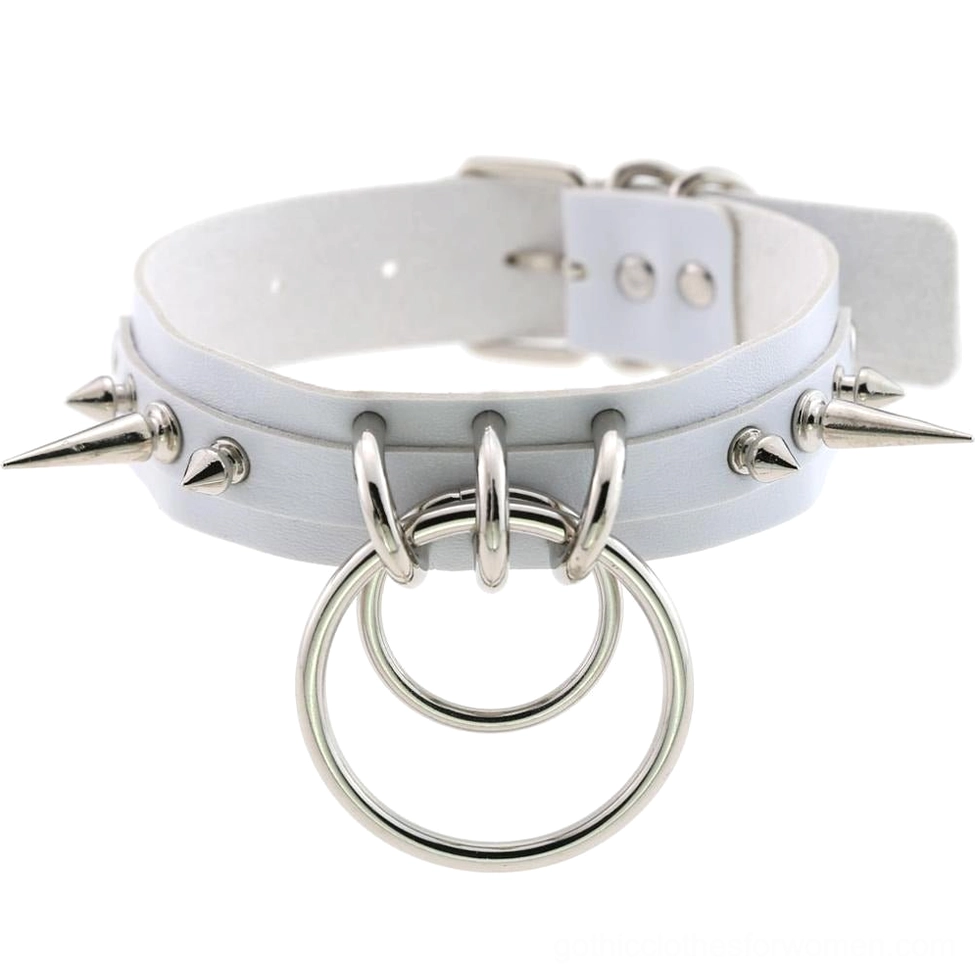 White spiked leather choker with silver metal spike decorations, double O-rings, and adjustable PU leather construction