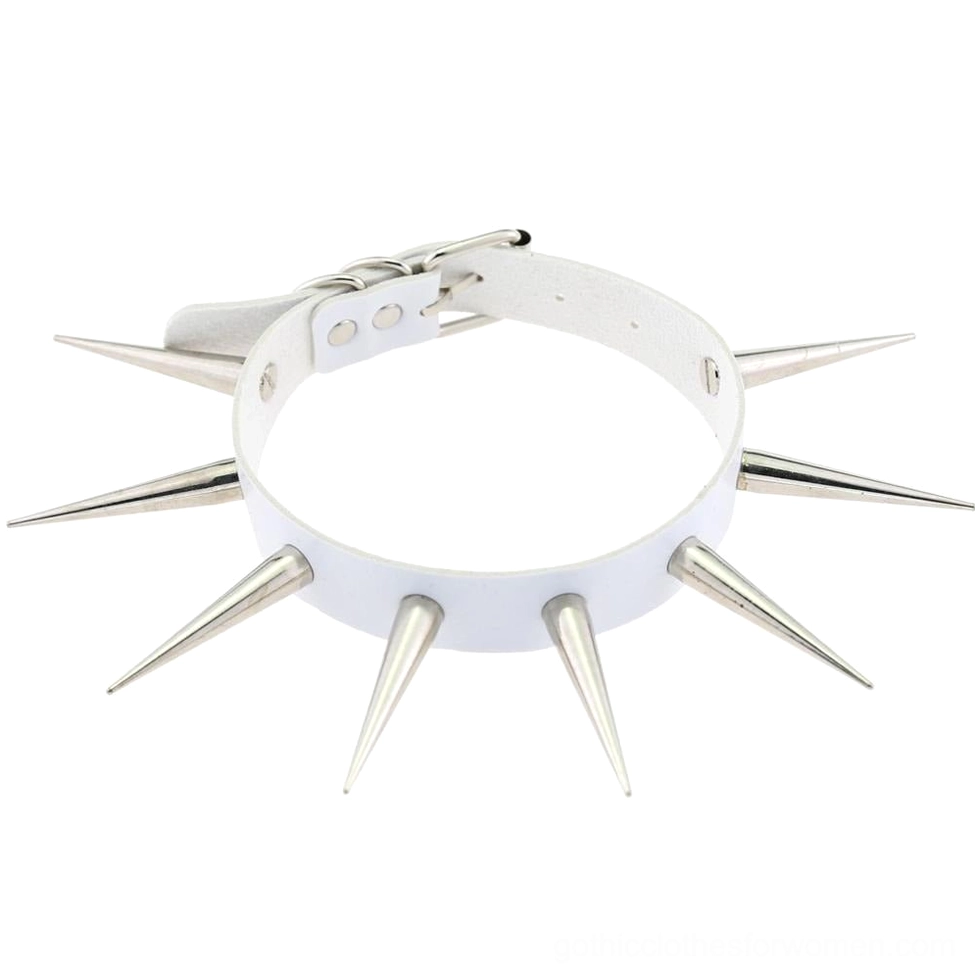 White faux leather gothic choker with metal spikes arranged flat on white background minimalist alternative style
