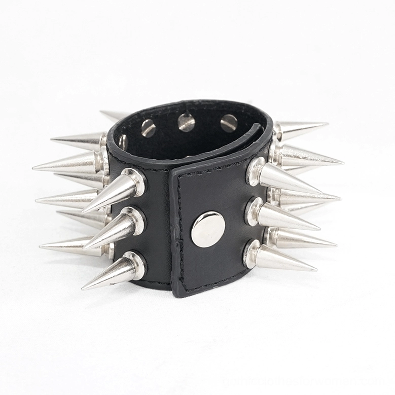 Wide spiked leather gothic bracelet side angle shot, revealing multi-row silver cone spike arrangement and snap fastener detail