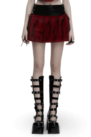 Front view of wine red flame tie-dye gothic skirt with black faux leather corset waist and adjustable lace-up details