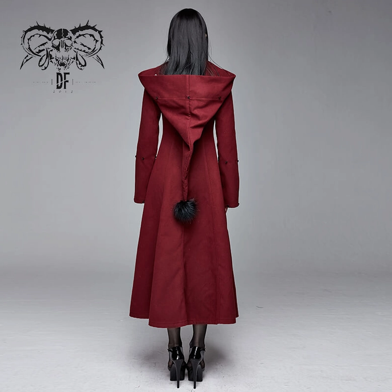 Full length view of wine red gothic long coat displaying dramatic flared hem and total silhouette