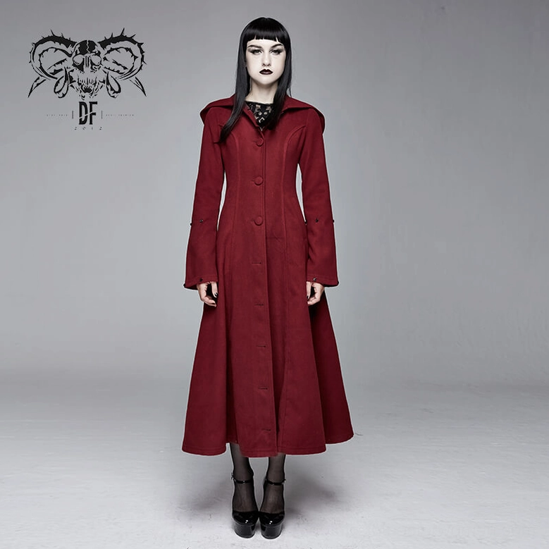 Side detail of wine red gothic coat showing seaming construction and slim-fit tailoring
